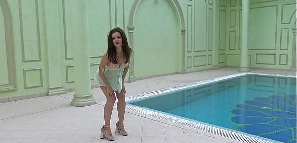  Sexiest petite teen Lizi Vogue swims naked in the pool